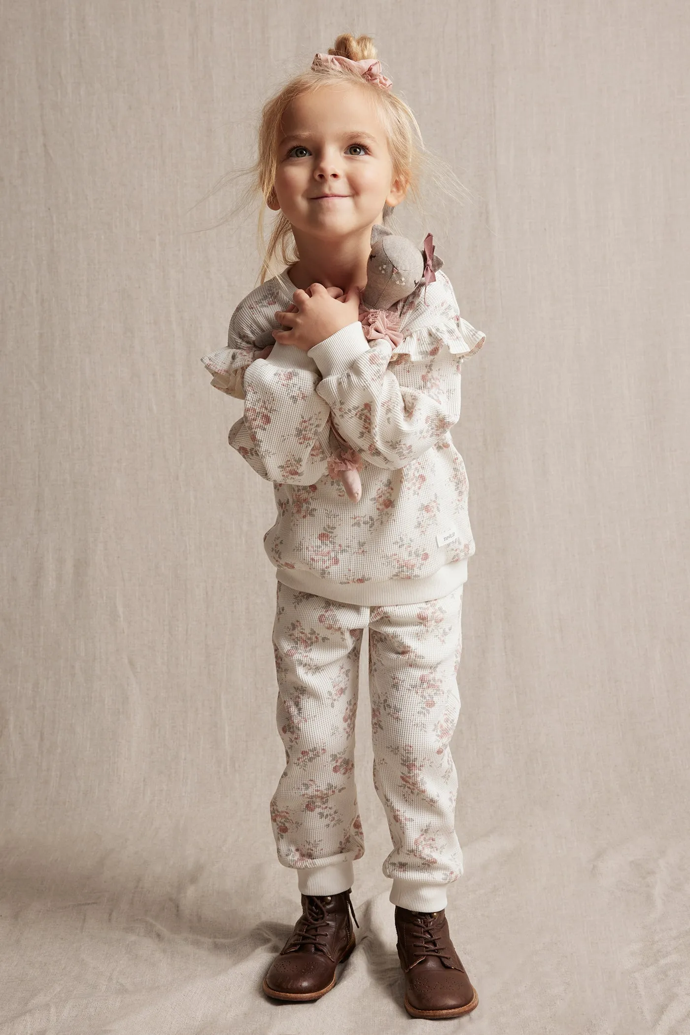 Kids' white floral trousers