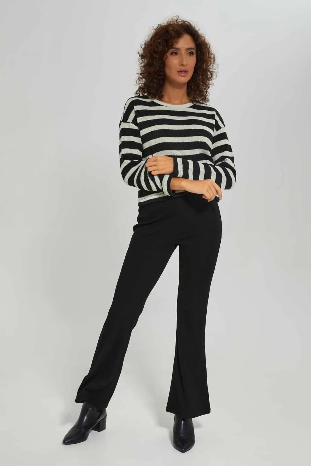 Women Black Solid Texture Flare Trouser