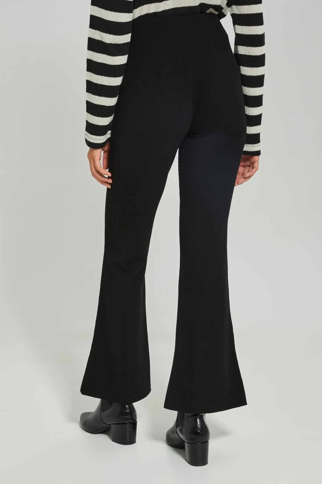 Women Black Solid Texture Flare Trouser